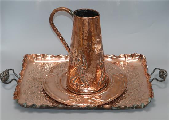 A Newlyn style copper jug, dish and tray